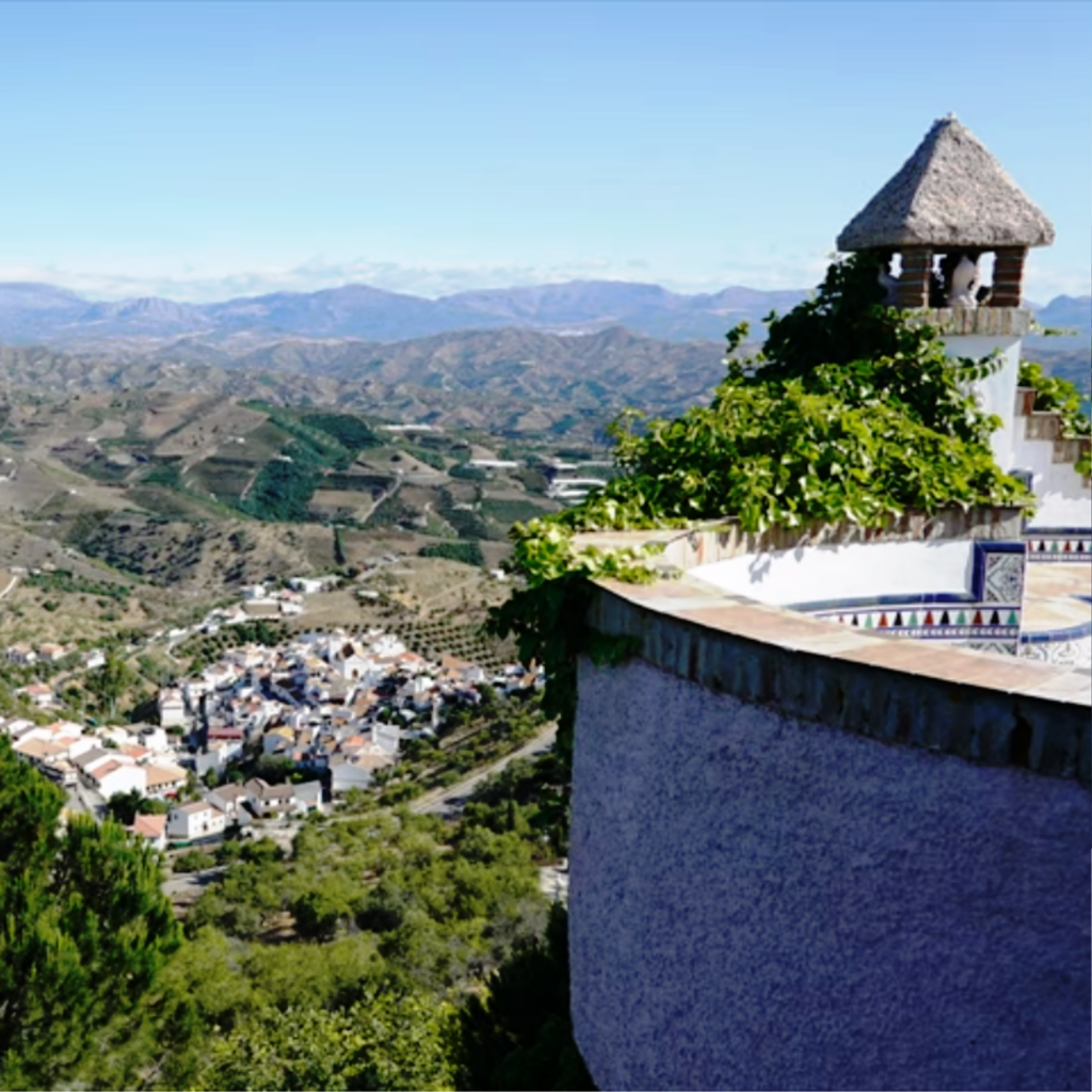 A terrace overlooking the Axarquia mountains and the village of Iznate