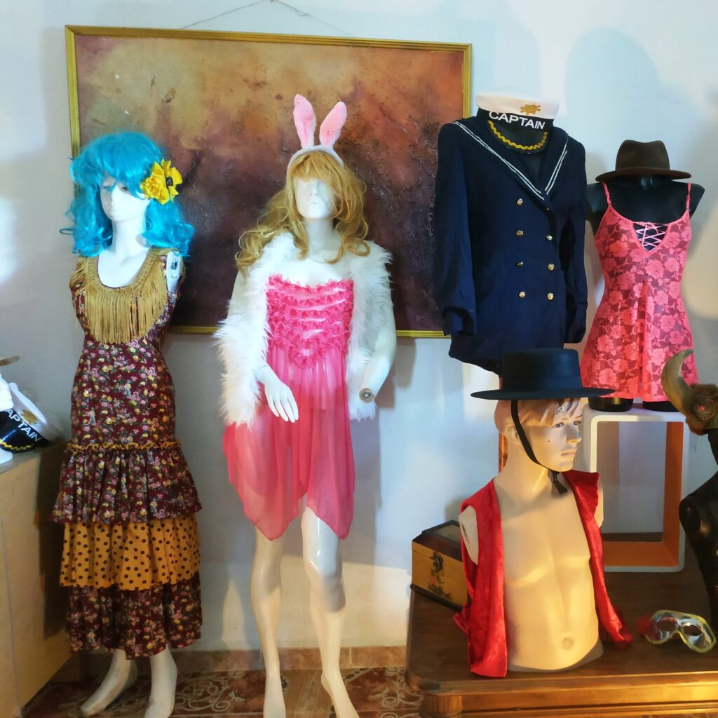 several mannequins dressed in fancy dress